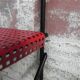 Steel wall rack with 2 shelves by Tjerk Reijenga perforated for Pilastro