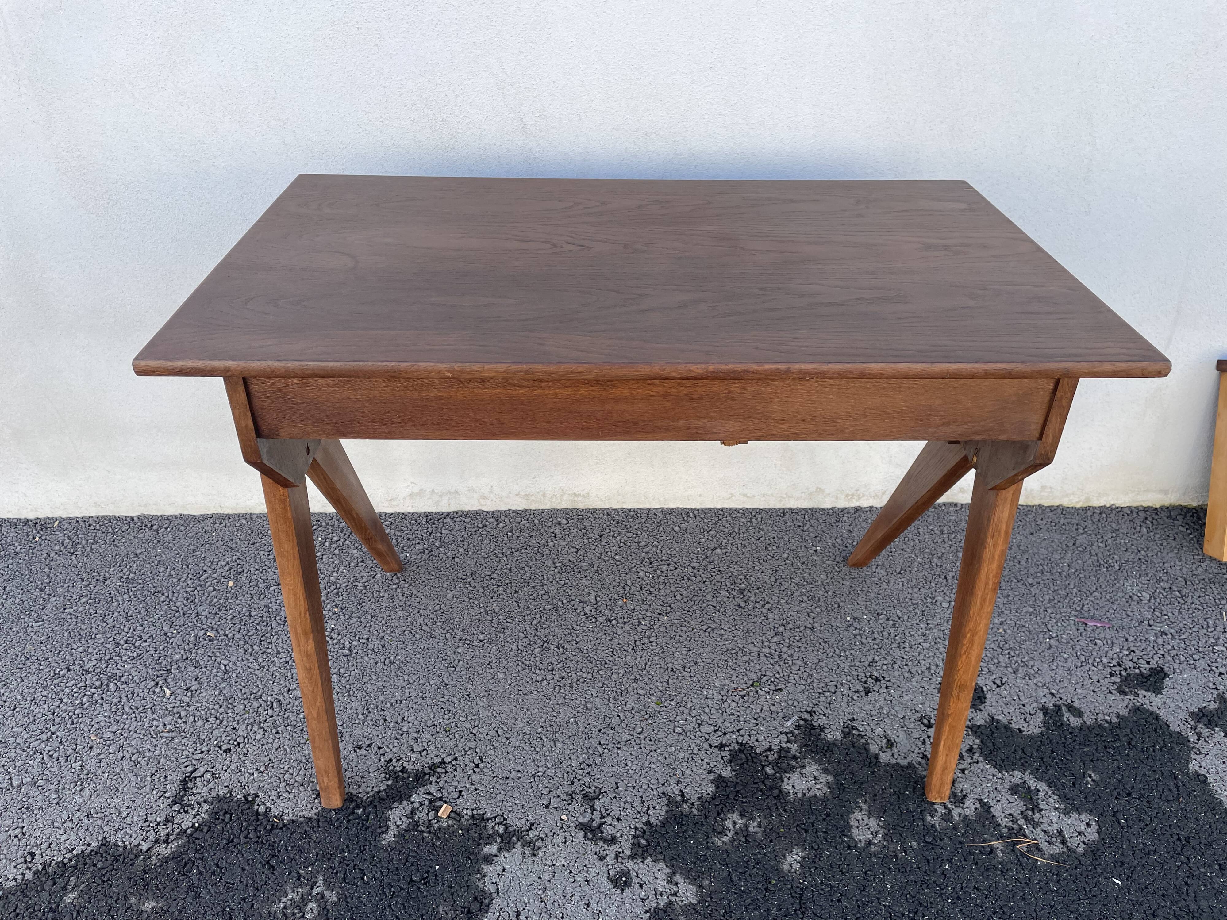 Modernist wooden desk with compass feet 1950