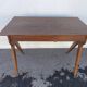 Bureau moderniste en bois à pieds compas 1950