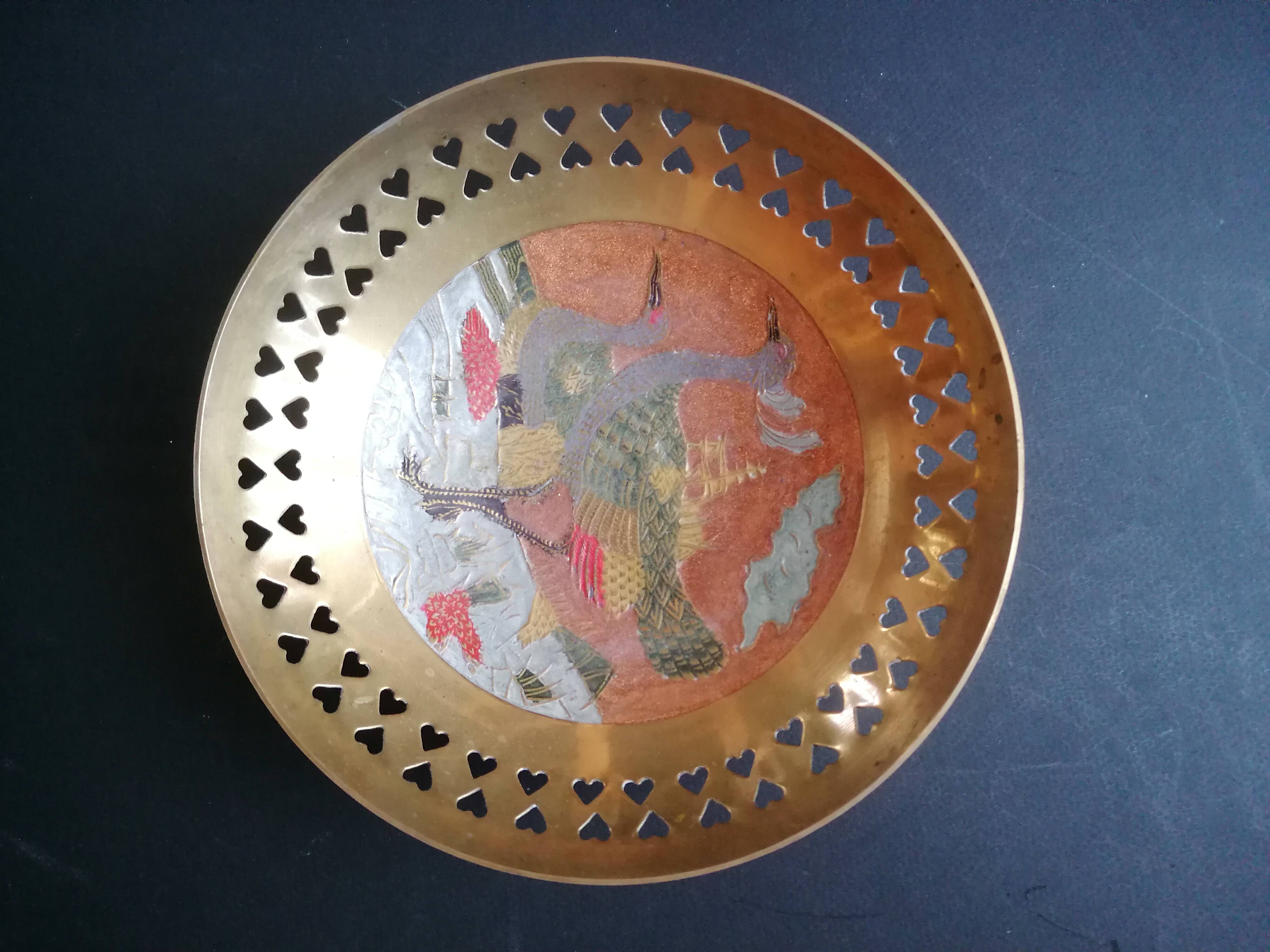 Enamelled brass bowl with peacock decoration