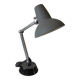 Super Chrome old articulated metal desk lamp on workshop decor base