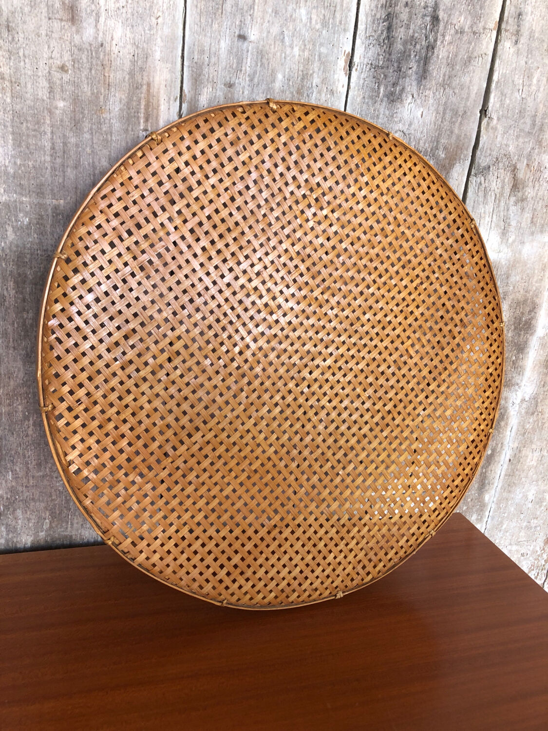 Old vintage braided wicker sieve
