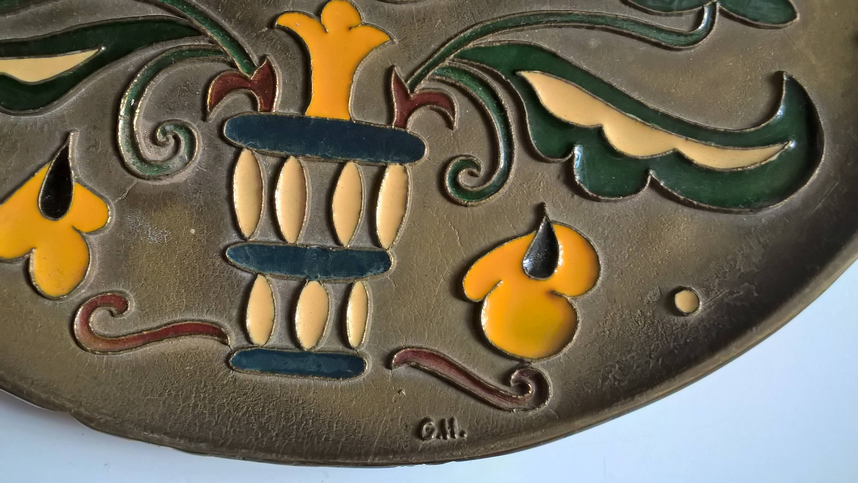 Old decorative brass and enamel wall plate signed GH