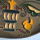 Old decorative brass and enamel wall plate signed GH