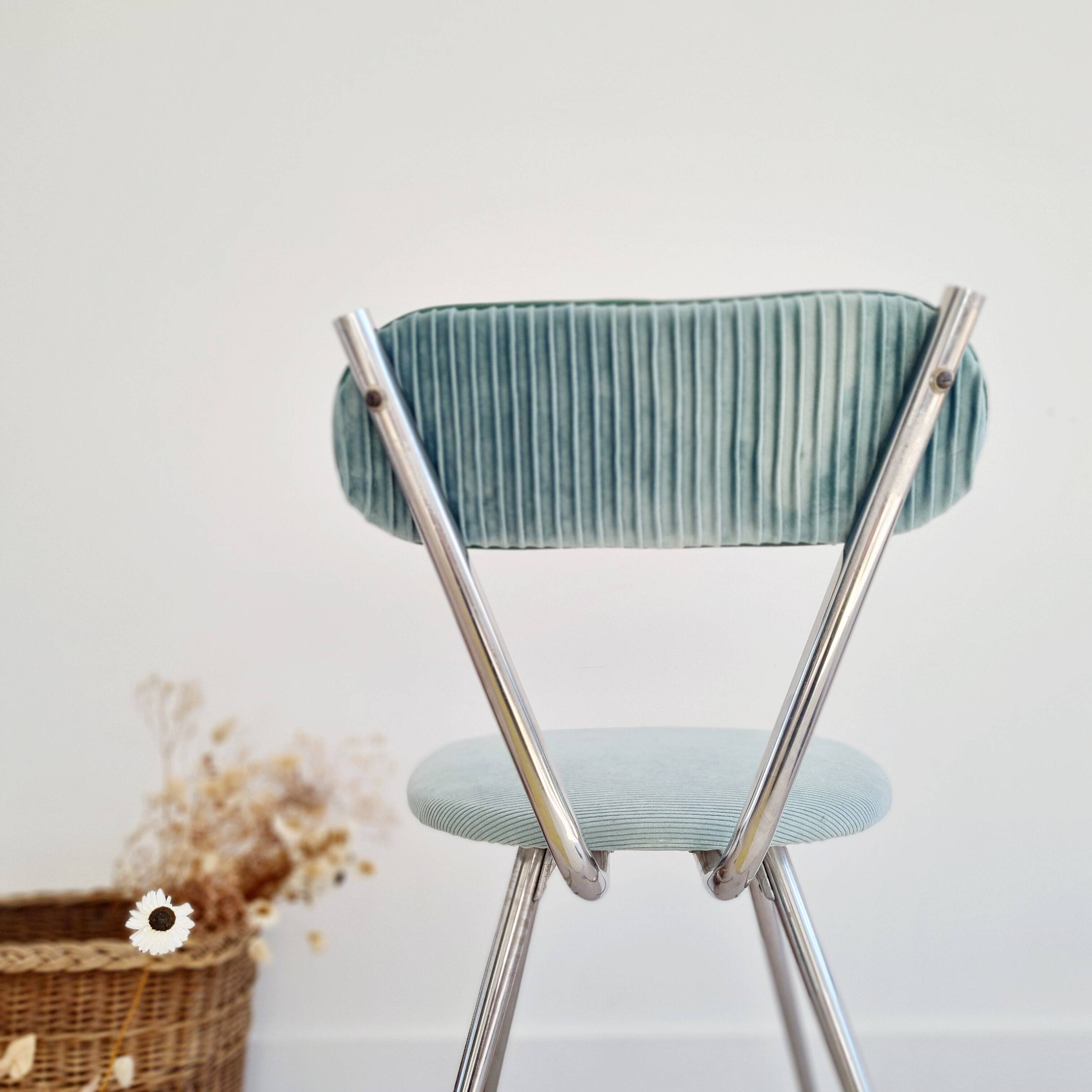 Old chrome metal and blue velvet chair