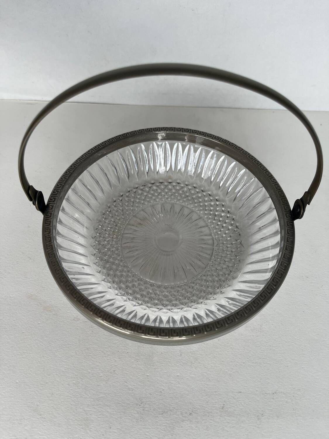 Antique glass cup with metal frame
