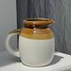 Small two-tone white and brown pitcher Made in China