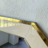 Octagonal mirror in white lacquer with brass surround