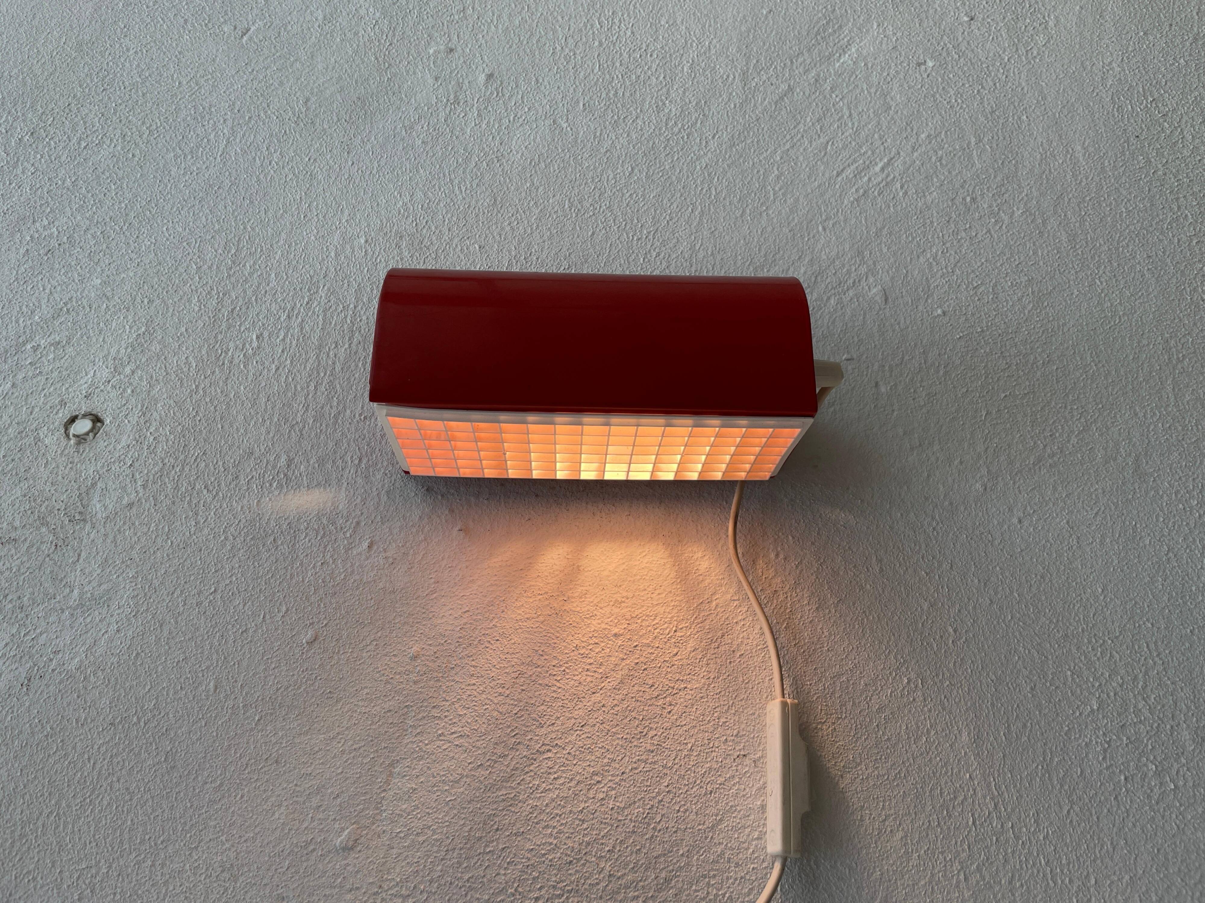 Simple red metal wall light from the AGE, 1970s, Germany.