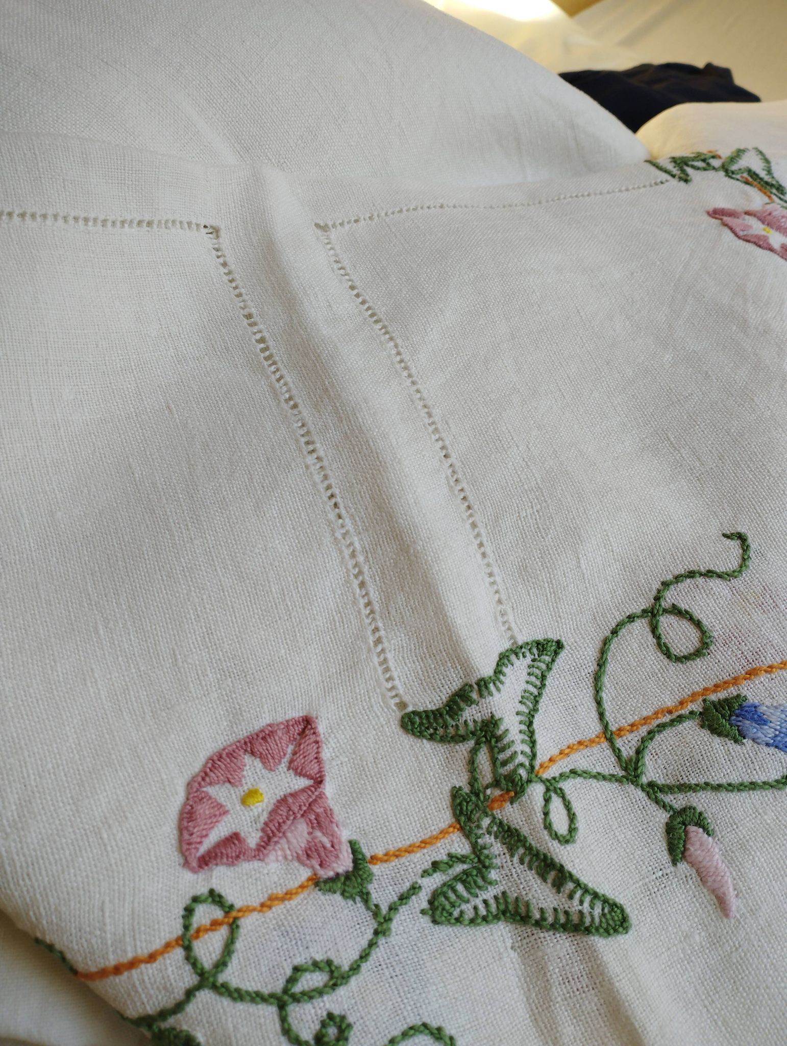 Antique linen tablecloth embroidered with flowers