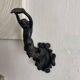 Antique cast iron coat hook with swimmer and shell basin.
