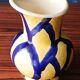 Free-form handmade vase in Art Deco style and period.
