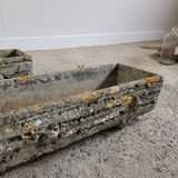 Old planters in faux cement wood