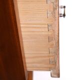 Scandinavian chest of drawers with metal handles