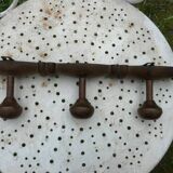 Vintage wooden wall coat rack with 3 hooks.