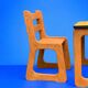 Children's wooden and formica desk and sled chairs 1970