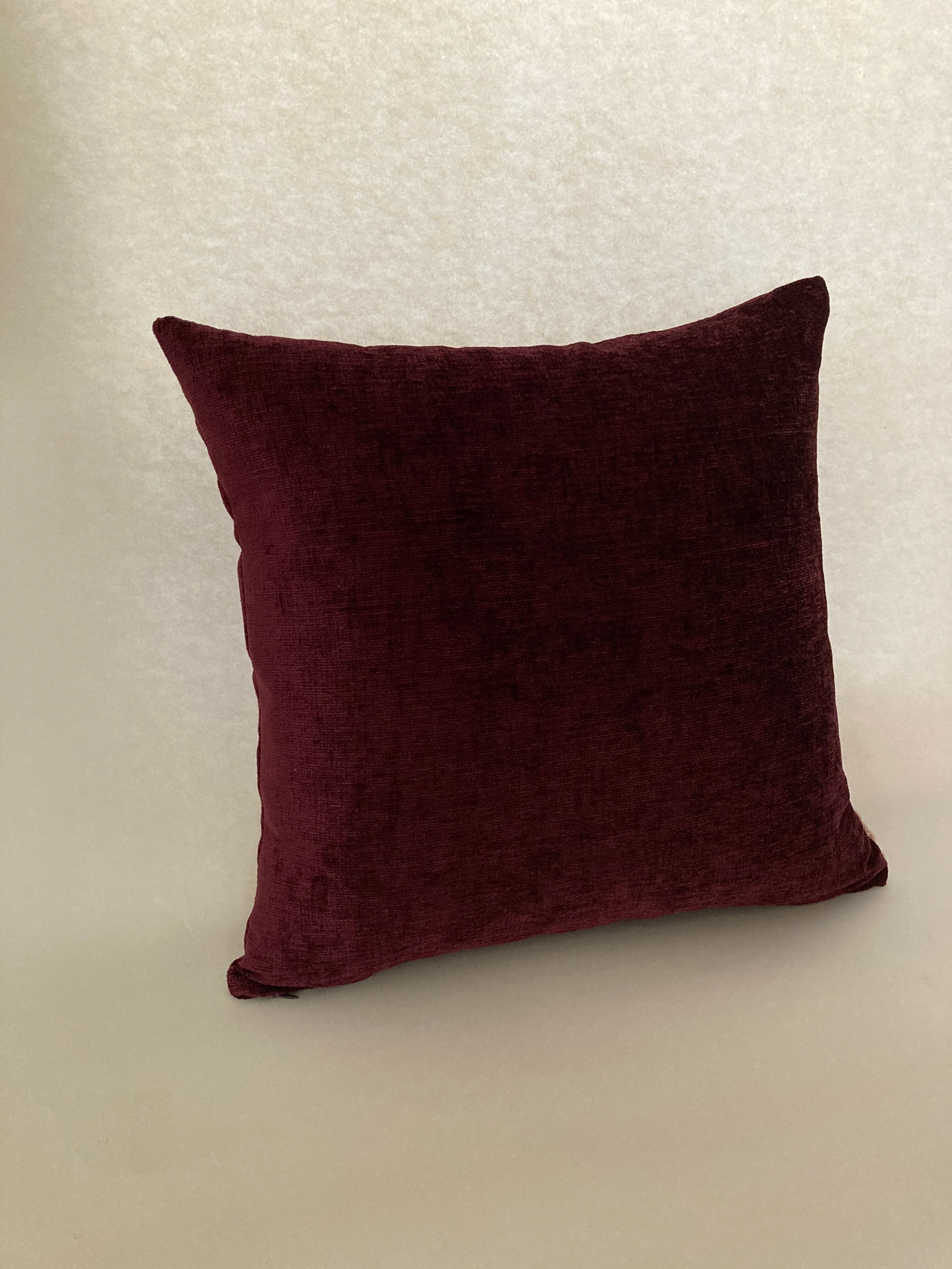 Plum velvet cushion
