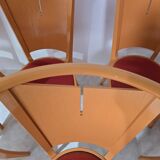 12 orange Baumann chairs 1970s