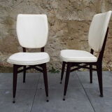 2 skai and wooden chairs