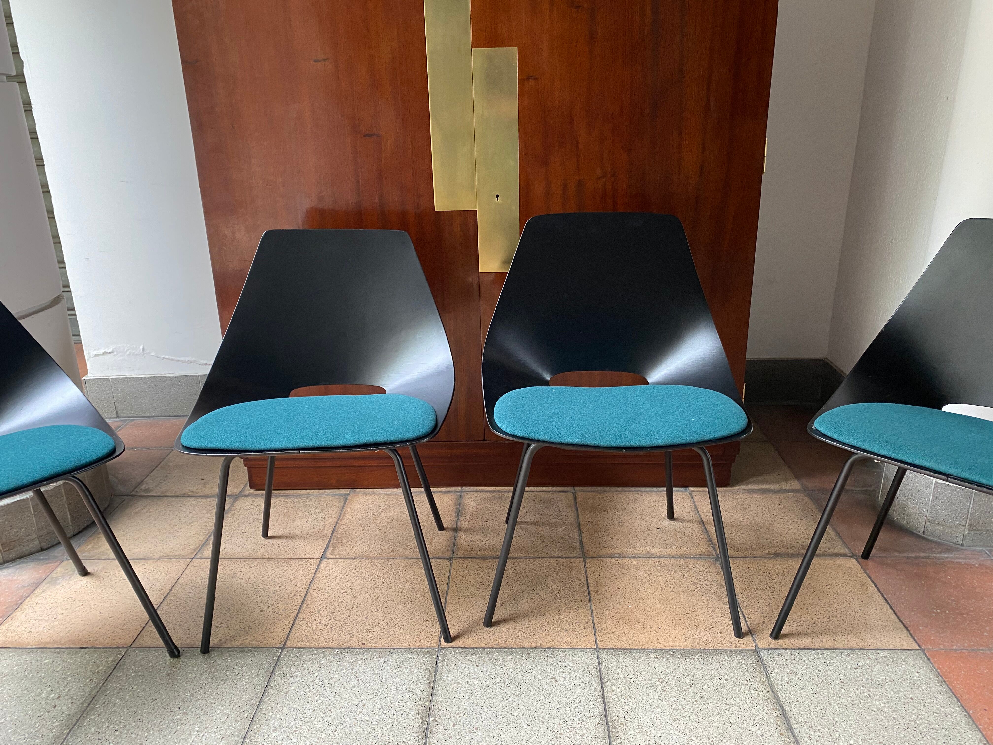 Series of 4 chair "Tonneau" by Pierre Guariche for Steiner