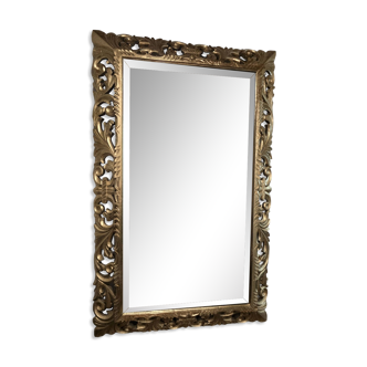 Golden mirror in carved wood beveled mirror
