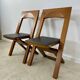 2 old folding chairs in wood and leather, postmodern design from the 80s vintage