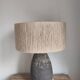 Table lamp in stoneware and natural jute