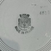 Set of 12 deep plates Saint Amand with floral garland decoration.
