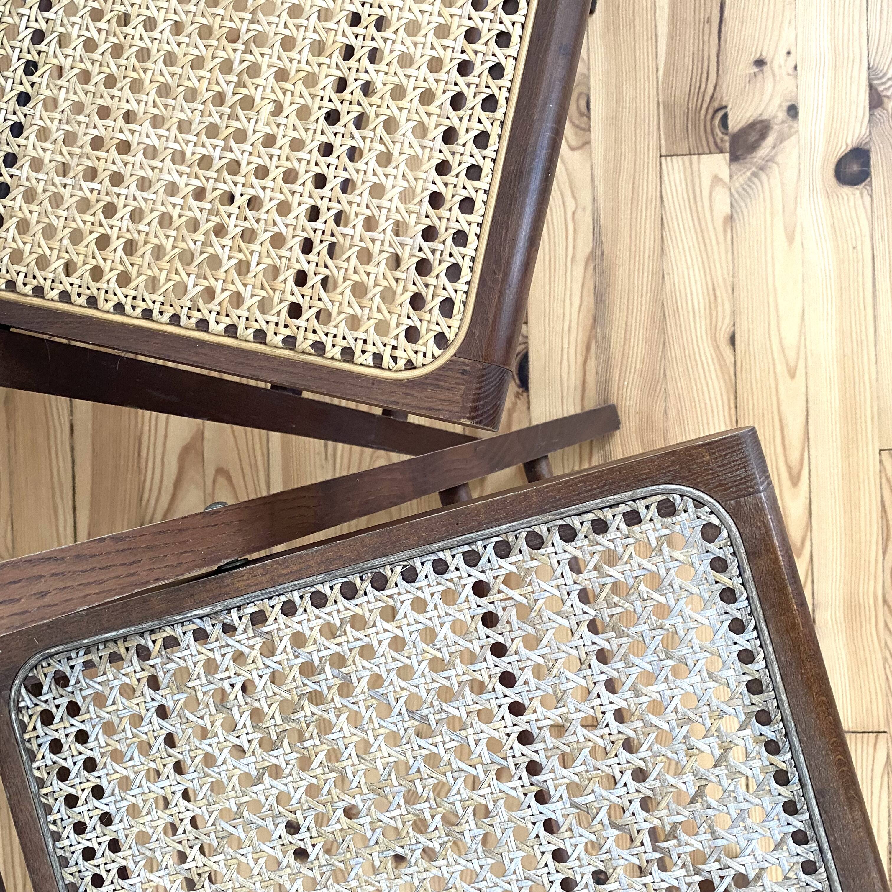 Two folding chairs wood and cannage