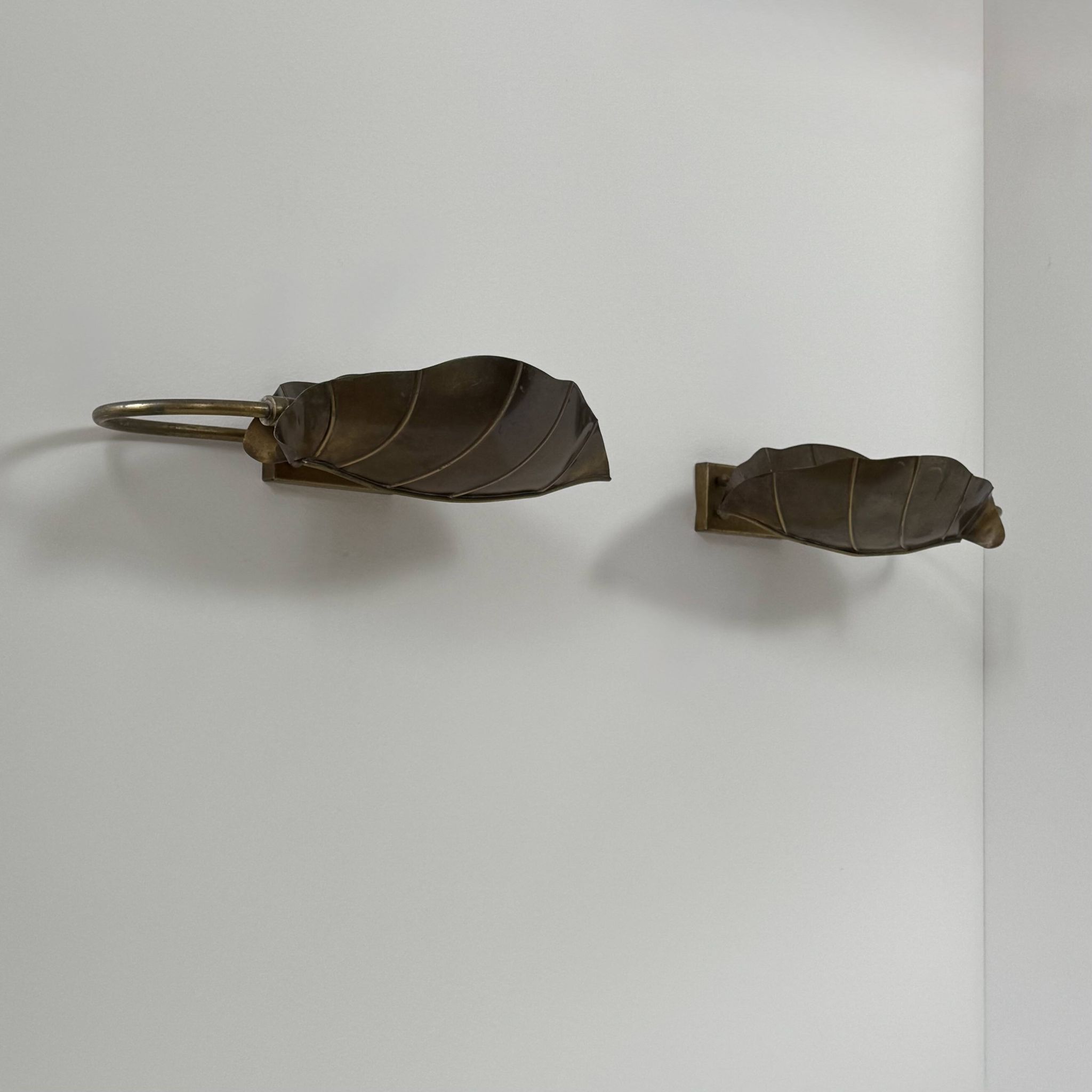 Pair of vintage wall lights, patinated brass, France, 1970.