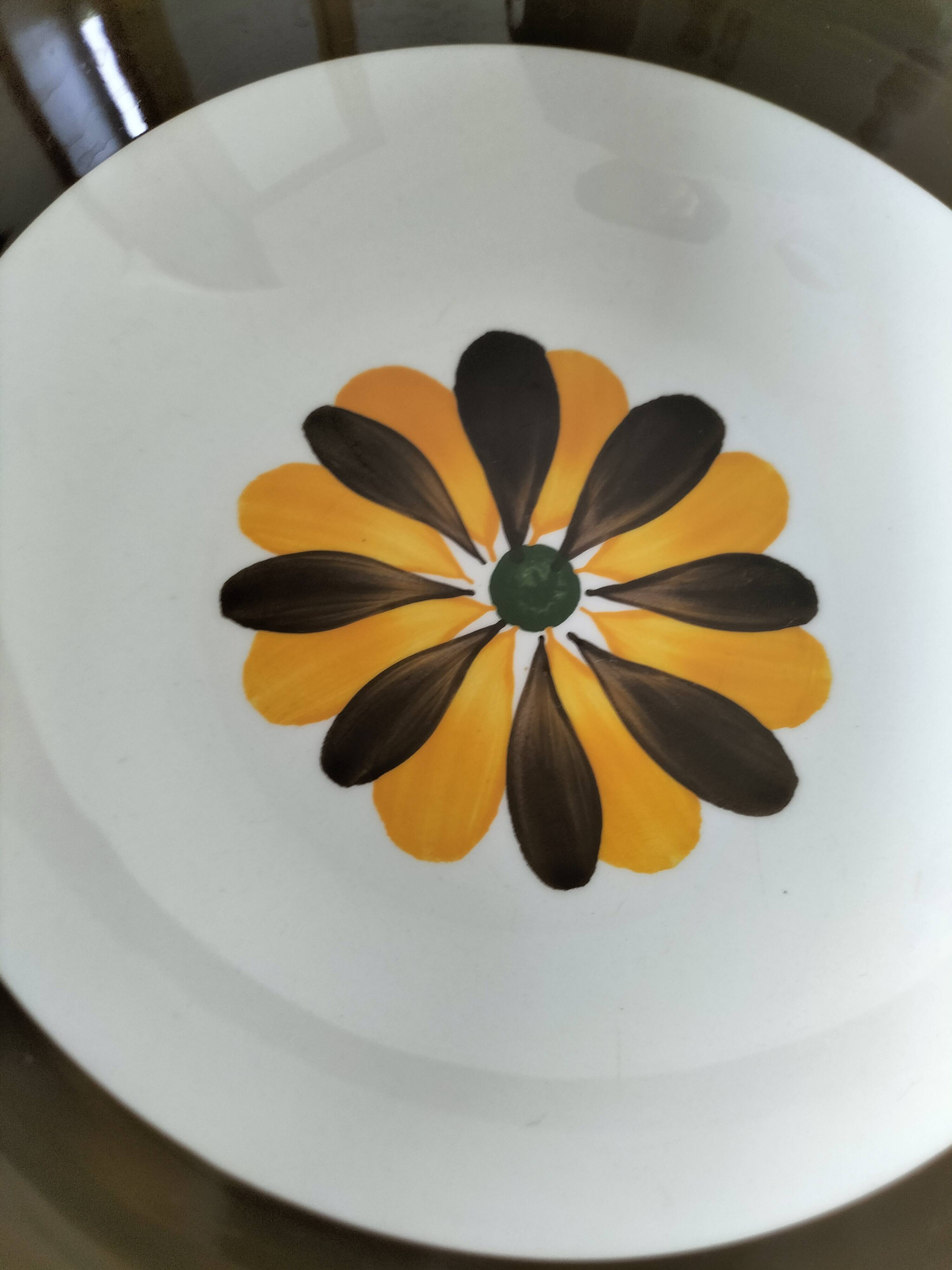 Trio of Italian 1970s deep plates, ochre brown floral decoration