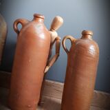 Trio of sandstone carafes with cove