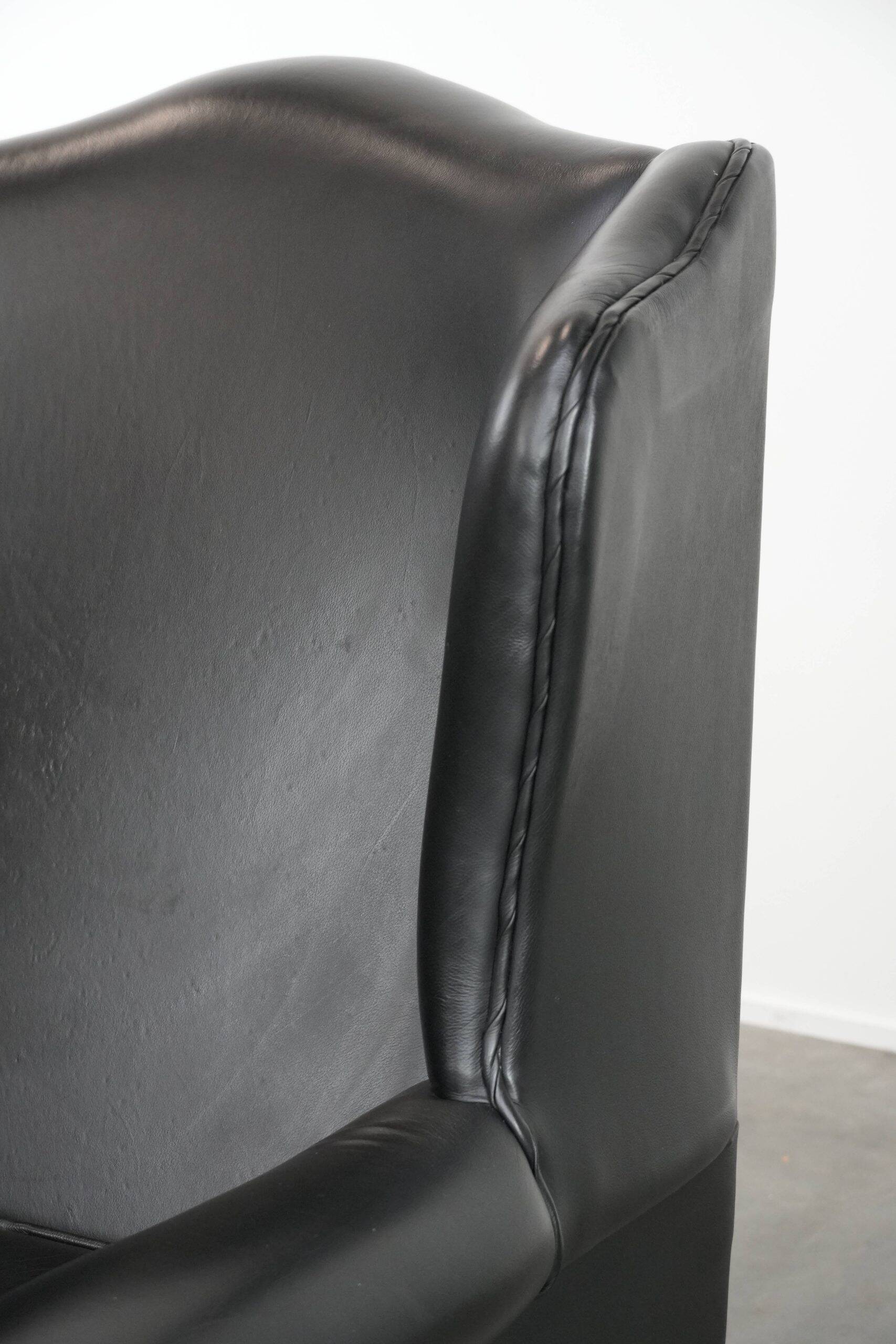 Black cowhide leather Chesterfield wingback chair in English style