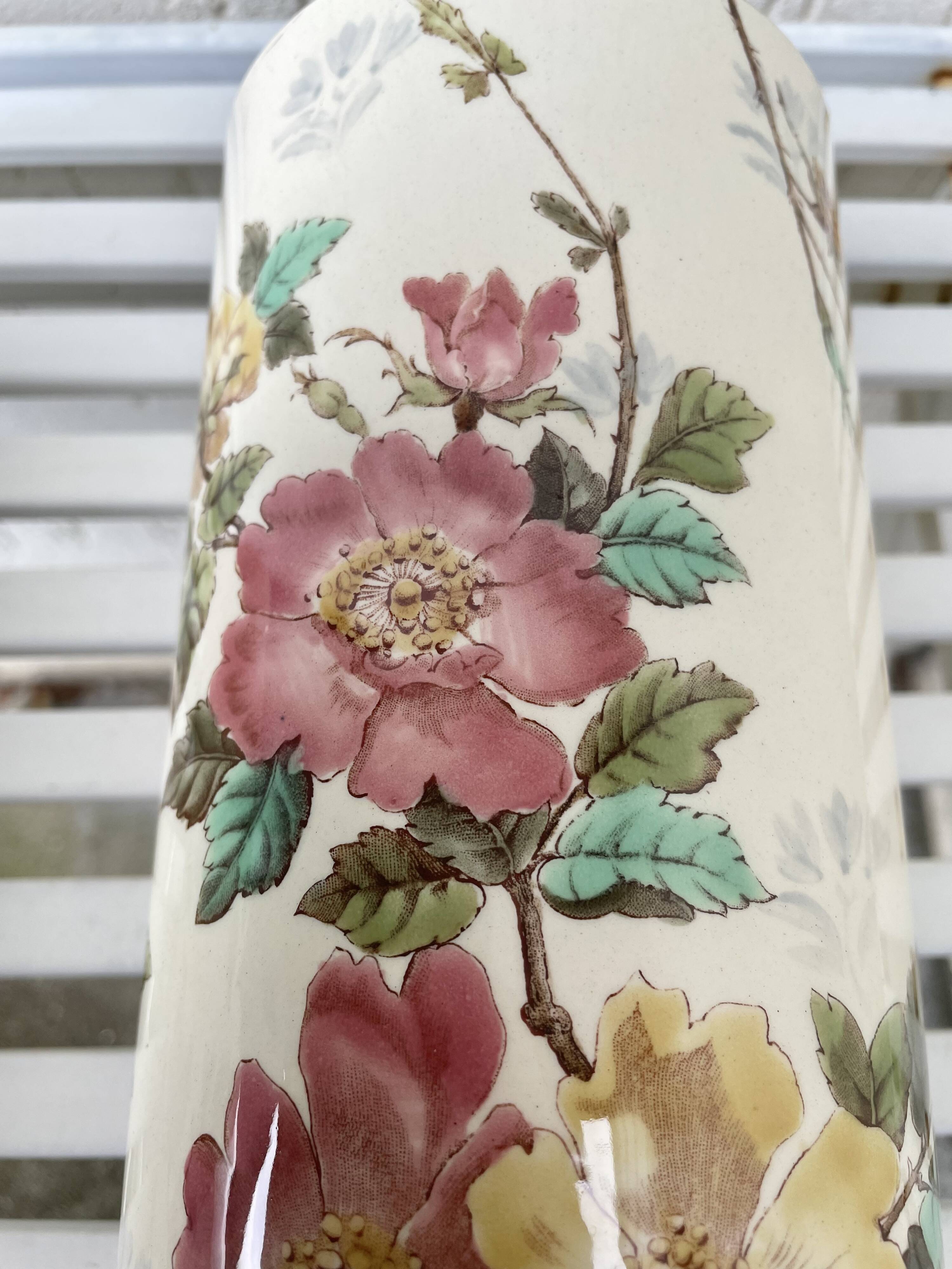 Roller vases in earthenware with floral decoration of wild rose, circa 1930–1950.