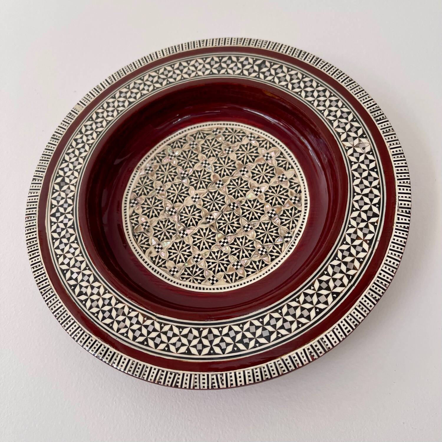 Wooden and mother-of-pearl plate
