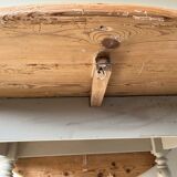 Round wooden table with flaps