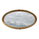 Miroir ovale en bois doré, style Louis XVI