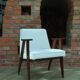 Scandinavian boucle armchair in snow white with dark walnut wood colour, designed by Chierowski, model 366.