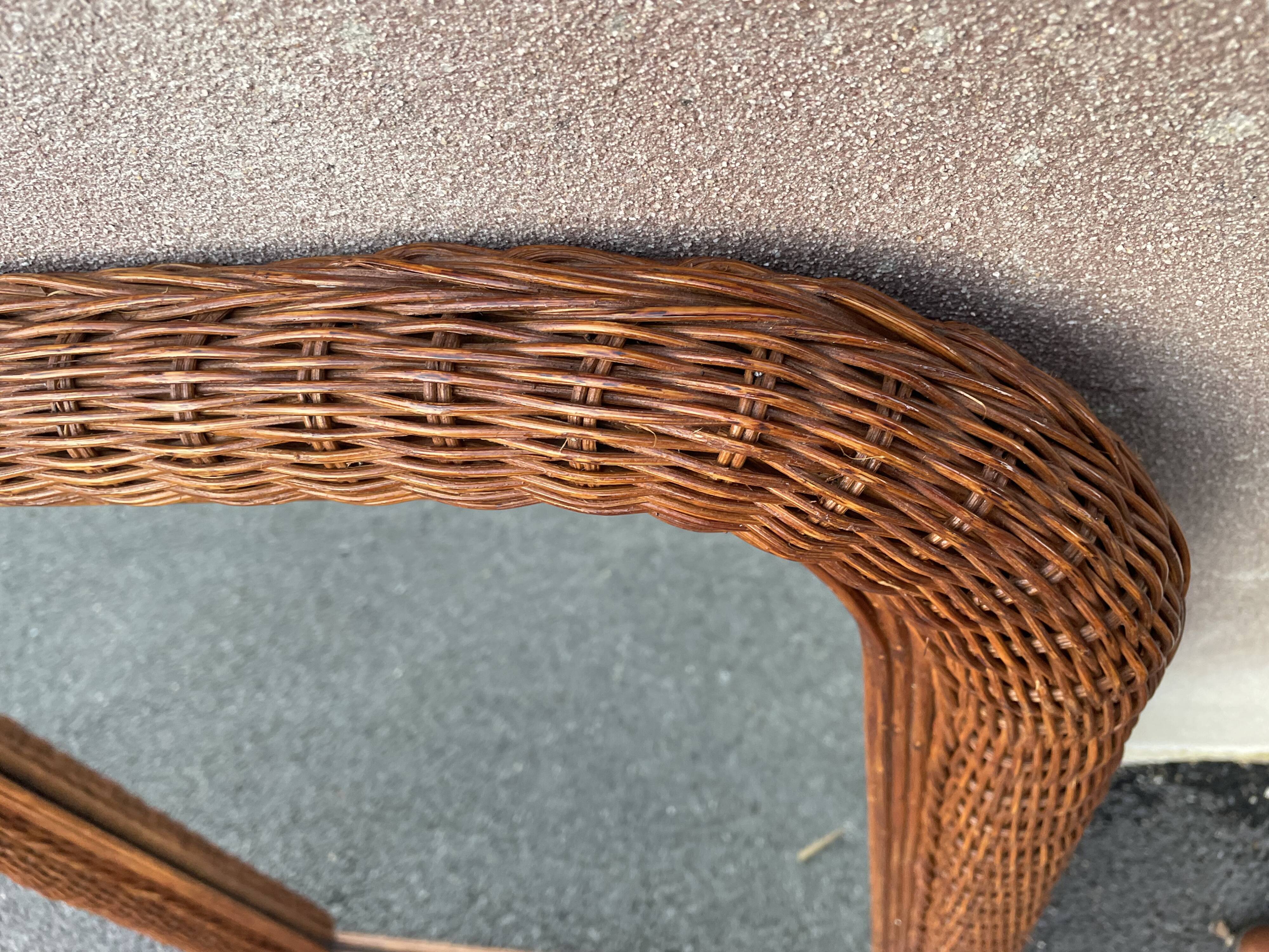 Curved rattan mirror 70s