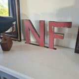 Letter F in vintage iron