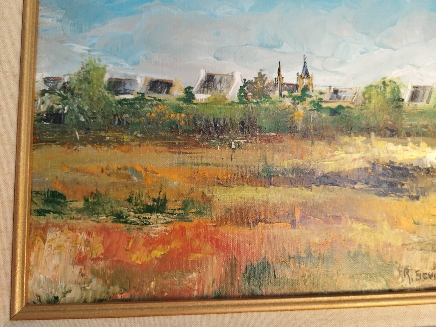 Oil on canvas "a Village in Brittany" signed by Raymond Scuiller