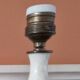 Pair of antique table lamps in white marble and gold metal.