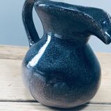Pitcher in varnished sandstone