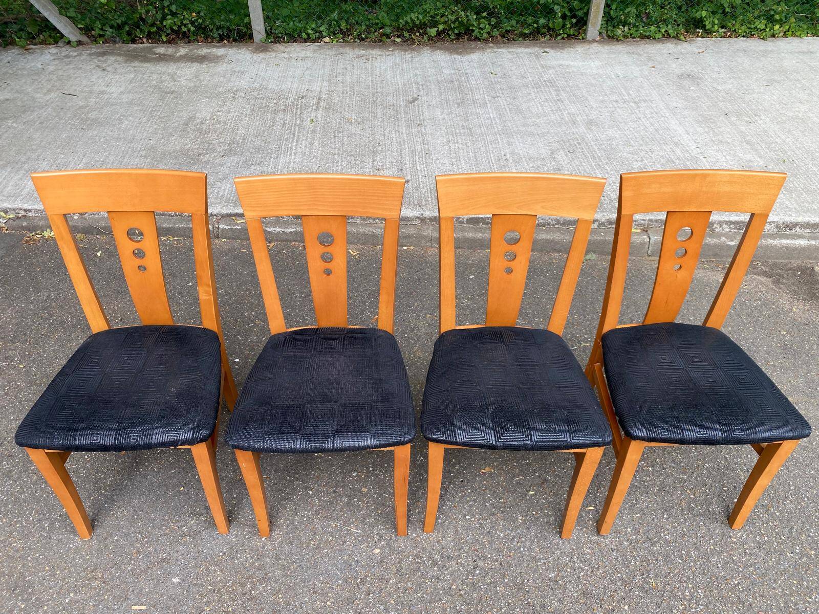 4 Scandinavian dining chairs in solid wood and black fabric from the 1990s.