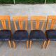 4 Scandinavian dining chairs in solid wood and black fabric from the 1990s.