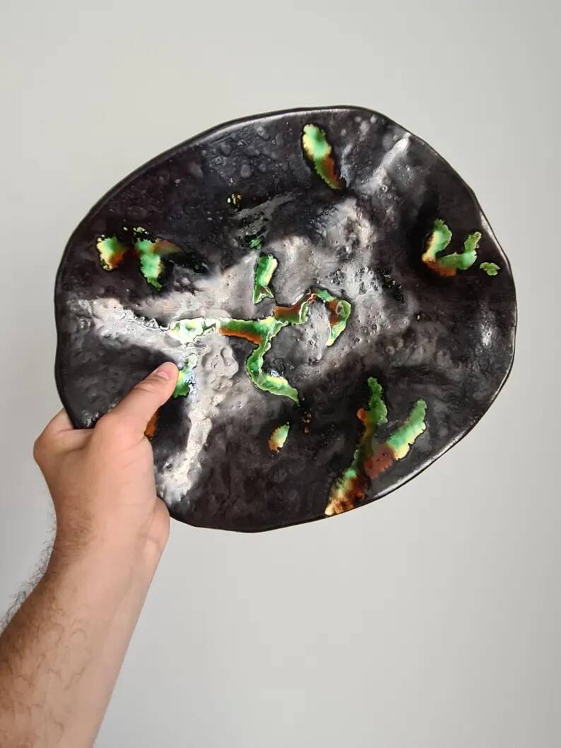 French ceramic bowl, lava glaze, black and green.
