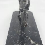 Pair of bookends, greyhounds in babbitt on black marble, Art Deco early 20th century