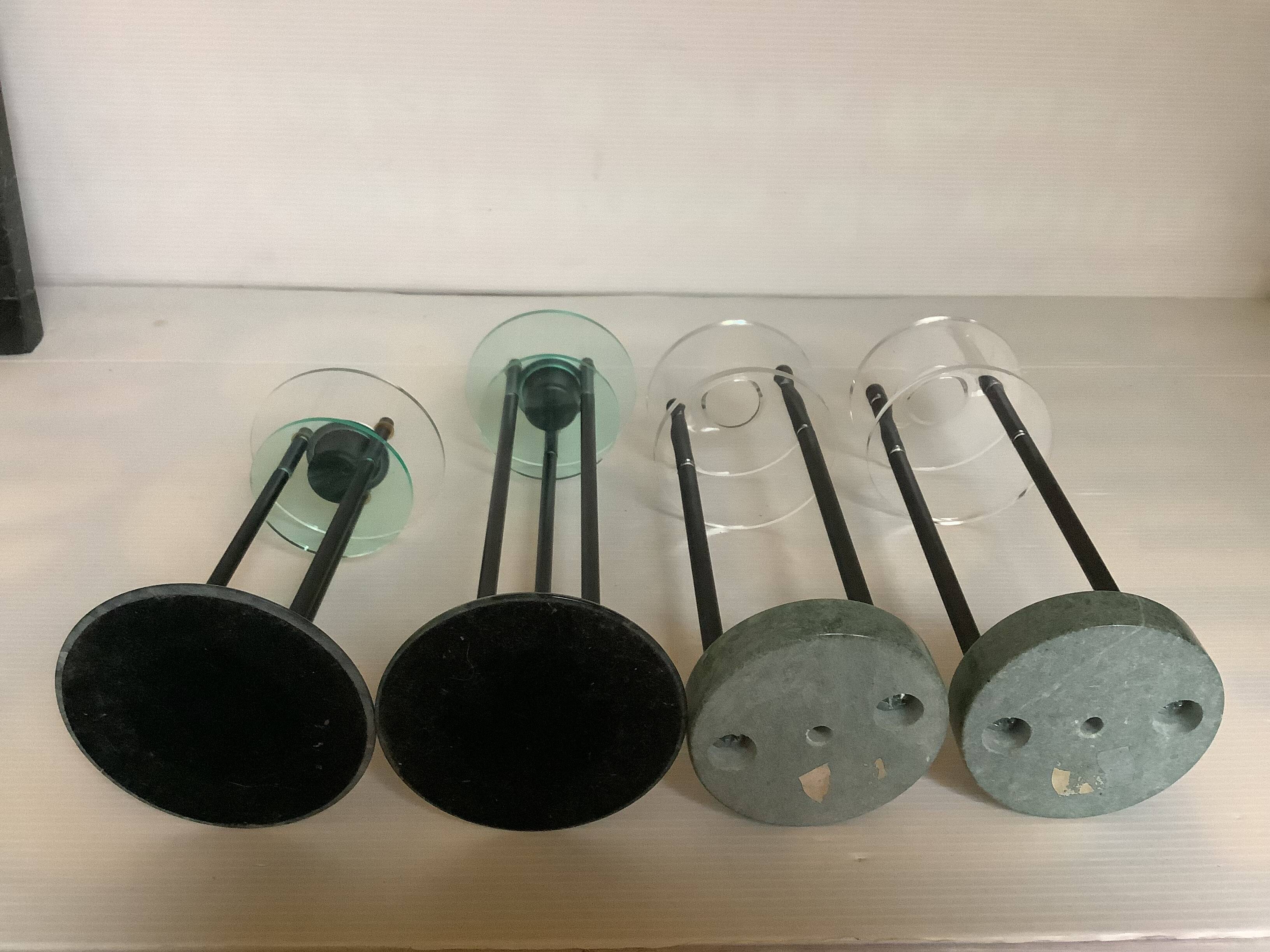Four postmodernist green marble candlesticks