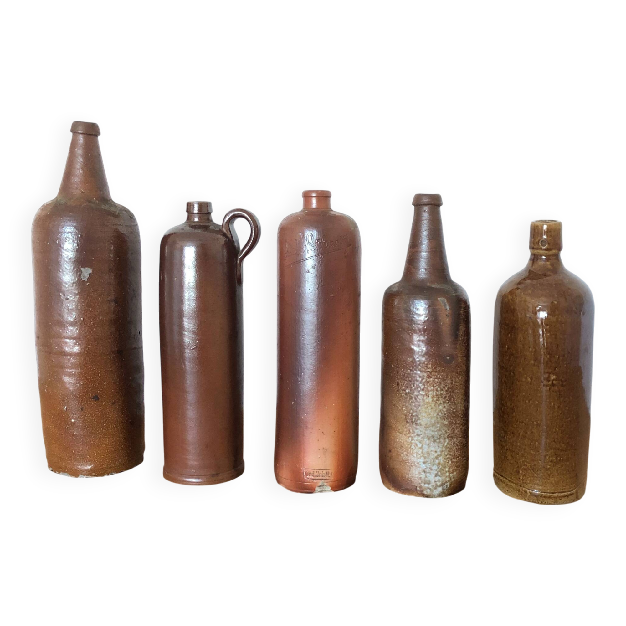 Set of 5 antique glazed stoneware bottles