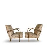 Ensemble de fauteuils Art Déco avec accoudoirs en hêtre arqués.